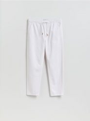 Jeansy jogger fit - biały. Białe jeansy męskie Reserved. Za 159.99 zł.