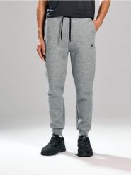 Spodnie dresowe jogger - szary. Szare spodnie sportowe męskie Sinsay, z dresówki. Za 59.99 zł.