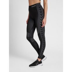 Damskie legginsy ze średnim stanem Hummel Shaping. Czarne legginsy damskie HUMMEL, m, bez wzorów, z dzianiny. Za 128.00 zł.