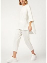 Milan Kiss Bluzka w kolorze kremowym rozmiar: L. Brązowe bluzki damskie Milan Kiss, l, bez wzorów, bez kołnierzyka, bez ramiączek. Za 173.99 zł.