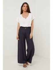 Lin Passion Lniane spodnie w kolorze granatowym rozmiar: 38/40. Niebieskie spodnie materiałowe damskie Lin Passion, bez wzorów, ze lnu, klasyczne, z standardowym stanem. Za 130.99 zł.