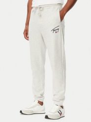 Tommy Jeans Spodnie dresowe DM0DM23593 Szary jasny Regular Fit. Szare spodnie dresowe męskie Tommy Jeans, bez wzorów, z bawełny. Za 289.99 zł.