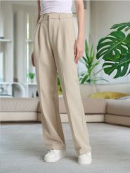 Spodnie wide leg - beżowy. Brązowe spodnie materiałowe damskie Sinsay, bez wzorów, z włókna, eleganckie. Za 49.99 zł.