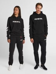 Bluza z kapturem Hummel Legacy Logo. Niebieskie bluzy sportowe damskie HUMMEL, na wiosnę, xs, bez wzorów, z bawełny, bez ramiączek, długie, z kapturem. Za 182.70 zł.