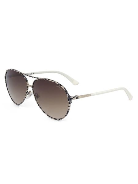 Guess Damskie okulary przeciwsłoneczne w kolorze beżowo-czarno-jasnobrązowym rozmiar: 60. Brązowe okulary przeciwsłoneczne damskie Guess. Za 154.95 zł.