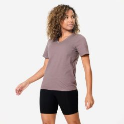 Koszulka z krótkim rękawem damska Domyos Gym & Pilates. Brązowe bluzki damskie NYAMBA, l, bez wzorów, z bawełny, bez ramiączek. Za 39.99 zł.
