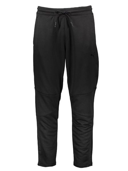 Puma Spodnie dresowe "Train Activate" w kolorze czarnym rozmiar: L. Czarne spodnie dresowe męskie Puma, bez wzorów, z dresówki. Za 134.53 zł.