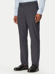 Calvin Klein Spodnie materiałowe LV04LB610G Granatowy Slim Fit. Niebieskie spodnie materiałowe męskie CALVIN KLEIN, bez wzorów, z materiału. Za 409.99 zł.