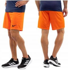 Pomarańczowe spodenki męskie Nike. Brązowe szorty męskie Nike, bez wzorów, z poliesteru, sportowe. Za 60.00 zł.
