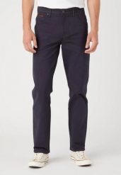 WRANGLER TEXAS SLIM MĘSKIE SPODNIE JEANSOWE DARK NAVY W12S93XAE. Niebieskie spodnie materiałowe męskie Wrangler, bez wzorów, z jeansu. Za 229.99 zł.