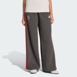 Spodnie Audi Revolut F1® Team Dna Z Szerokimi Nogawkami. Czarne spodnie dresowe damskie Adidas, l, bez wzorów, z polaru. Za 259.00 zł.