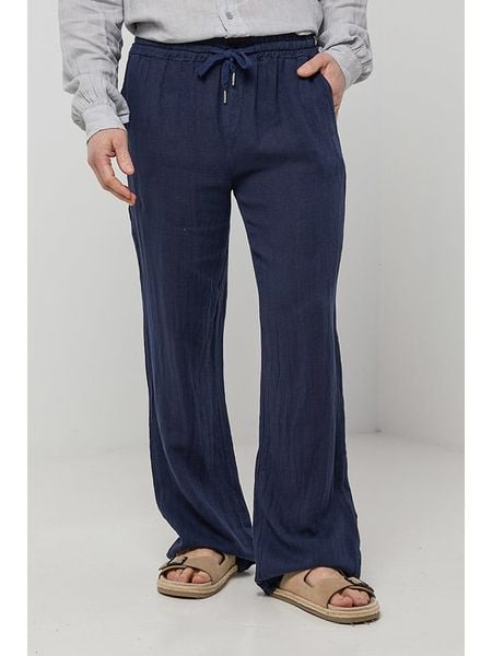 Rodier Lin Lniane spodnie w kolorze granatowym rozmiar: M/L. Niebieskie spodnie materiałowe męskie Rodier Lin, bez wzorów, ze lnu. Za 113.10 zł.