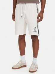 Tommy Hilfiger Szorty sportowe Crest Embroidery MW0MW42878 Beżowy jasny Relaxed Fit. Brązowe szorty męskie Tommy Hilfiger, bez wzorów, z bawełny, sportowe. Za 489.99 zł.