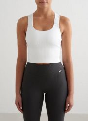 Damski biustonosz sportowy wysokie wsparcie, wydłużony Ribbed Seamless biały. Białe biustonosze sportowe damskie Aim'n, bez wzorów, z dzianiny. Za 258.00 zł.
