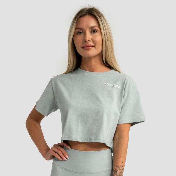 Koszulka damska fitness krótka luźna eukaliptusowa Limitless. Zielone bluzki sportowe damskie GYMBEAM, s, bez wzorów, z bawełny, bez ramiączek. Za 76.90 zł.