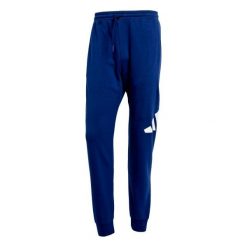 Spodnie do biegania adidas Essentials Big Logo. Niebieskie spodnie materiałowe męskie Adidas, bez wzorów, z bawełny, klasyczne. Za 214.10 zł.