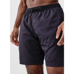 Spodenki do biegania męskie Kiprun Run 500 Dry. Niebieskie szorty męskie KIPRUN, z elastanu, bez kołnierzyka. Za 59.99 zł.