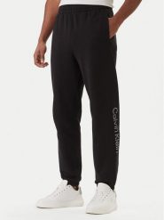 Calvin Klein Spodnie dresowe Eu Sportswear Graphic LV04LF236G Czarny Regular Fit. Czarne spodnie dresowe męskie CALVIN KLEIN, bez wzorów, z bawełny. Za 369.99 zł.