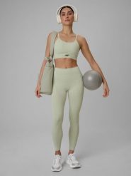 4F Legginsy treningowe bezszwowe damskie - zielone XS/S. Zielone legginsy damskie 4f, s, bez wzorów, ze skóry. Za 149.99 zł.