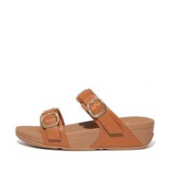 Kobiece klapki na koturnie FitFlop Lulu. Brązowe klapki damskie FIT FLOP, bez wzorów, bez obcasa, na koturnie. Za 565.50 zł.
