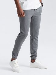 Spodnie męskie dresowe ze strukturalnej dzianiny - grafitowe V5 OM-PASK-0211 - XXL. Szare spodnie dresowe męskie Ombre Clothing, z aplikacjami, z bawełny. Za 143.99 zł.