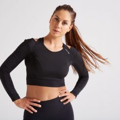 Second Life - Koszulka fitness damska Domyos długi rękaw - Stan Doskonały. Czarne bluzki sportowe damskie DOMYOS, l, bez wzorów, z materiału, bez ramiączek. Za 51.99 zł.
