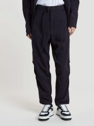 G-Star Spodnie w kolorze granatowym rozmiar: W30. Niebieskie spodnie materiałowe damskie G-Star, bez wzorów, z materiału, retro. Za 319.95 zł.