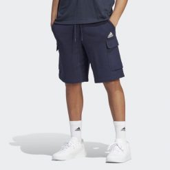 Spodenki krótkie męskie addidas Essentials. Niebieskie szorty męskie Adidas, bez wzorów, sportowe. Za 140.99 zł.