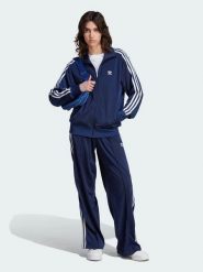 Adidas Spodnie dresowe "Firebird" w kolorze granatowym rozmiar: S. Niebieskie spodnie dresowe damskie Adidas, s, bez wzorów, z dresówki. Za 135.49 zł.