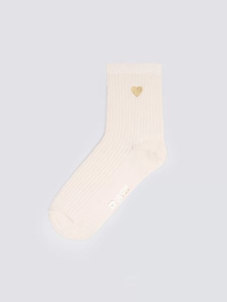 Skarpety damskie prążkowane kremowe Sonja 102. Białe skarpetki damskie Big Star, bez wzorów, z bawełny. W wyprzedaży za 9.99 zł.
