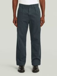 G-Star Spodnie chino w kolorze granatowym rozmiar: W38/L34. Niebieskie spodnie materiałowe męskie G-Star, z aplikacjami, retro. Za 227.31 zł.
