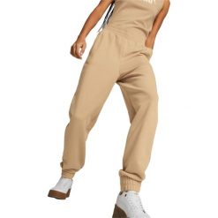 Spodnie Puma Ess Embroidery High-waist Pants Tr Cl D, Kobiety. Brązowe spodnie materiałowe damskie Puma, bez wzorów, z bawełny, z podwyższonym stanem. Za 290.00 zł.