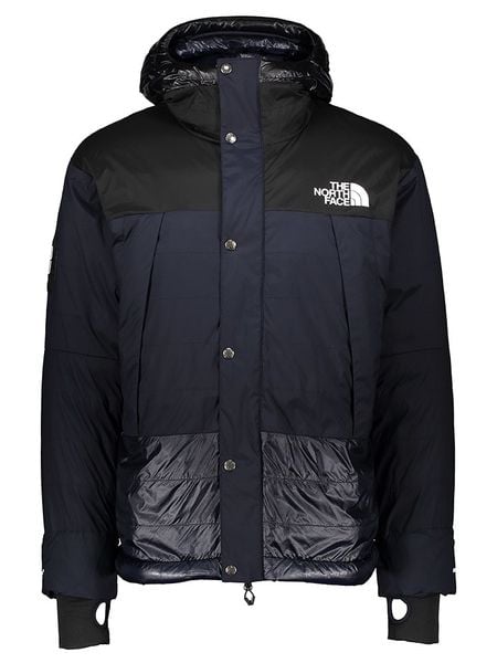 The North Face Kurtka puchowa "Soukuu" w kolorze czarno-granatowym rozmiar: XL. Czarne kurtki męskie The North Face, na zimę, xl, bez wzorów, z puchu, bez kaptura. Za 1,003.18 zł.