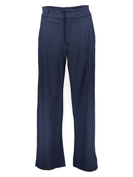 JDY Spodnie w kolorze granatowym rozmiar: M/L32. Niebieskie spodnie materiałowe damskie JDY, bez wzorów, z materiału. Za 93.07 zł.