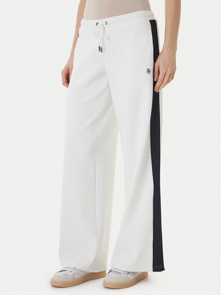 Guess Jeans Spodnie dresowe W6GBB6 KB212 Biały Relaxed Fit. Białe jeansy damskie Guess Jeans, xxl, z aplikacjami, z dresówki. Za 434.99 zł.