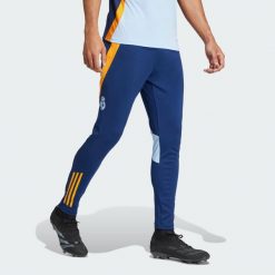 Spodnie Real Madrid Tiro 24 Competition Training. Brązowe spodnie dresowe męskie Adidas, bez wzorów, z dresówki. W wyprzedaży za 209.30 zł.