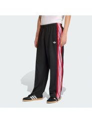 Adidas Spodnie dresowe KE0117 Czarny Loose Fit. Czarne spodnie dresowe męskie Adidas, bez wzorów, z dresówki. Za 339.99 zł.