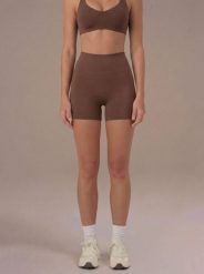 Szorty Motion - Brązowy. Brązowe spodenki sportowe damskie JOY STUDIO, xl, z materiału, do biegania. Za 168.00 zł.