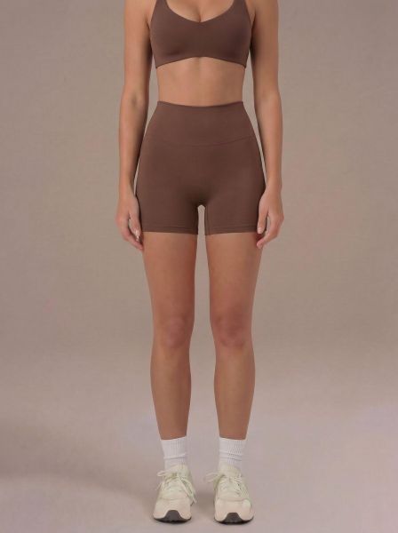 Szorty Motion - Brązowy. Brązowe spodenki sportowe damskie JOY STUDIO, xl, z materiału, do biegania. Za 168.00 zł.