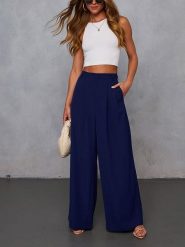 Milan Kiss Spodnie w kolorze granatowym rozmiar: S. Niebieskie spodnie materiałowe damskie Milan Kiss, bez wzorów, z materiału. Za 174.43 zł.