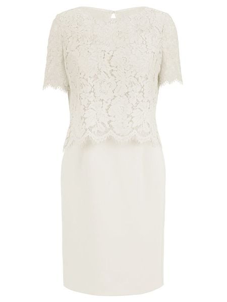 APART Sukienka w kolorze białym rozmiar: 38. Białe sukienki damskie Apart, bez wzorów, z koronki, bez kołnierzyka, bez ramiączek, mini. Za 315.95 zł.