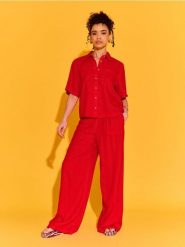 Spodnie wide leg z domieszką lnu - pomarańczowy. Brązowe spodnie materiałowe damskie Sinsay, bez wzorów. Za 39.99 zł.