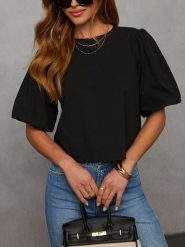 Milan Kiss Bluzka w kolorze czarnym rozmiar: XL. Czarne bluzki damskie Milan Kiss, xl, bez wzorów, bez kołnierzyka, bez ramiączek. Za 109.26 zł.