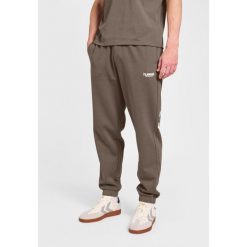 Spodnie do biegania Hummel Legacy 2.0. Niebieskie spodnie dresowe męskie HUMMEL, na lato, bez wzorów, z dresówki. Za 269.50 zł.