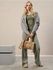 Spodnie wide leg - zielony. Zielone spodnie materiałowe damskie Sinsay, bez wzorów. Za 49.99 zł.