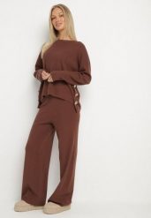 Brązowy Dzianinowy Komplet z Wiskozą Szerokie Spodnie i Sweter z Aplikacjami Miozara. Brązowe spodnie materiałowe damskie Born2be, z aplikacjami, z dzianiny, eleganckie. Za 199.99 zł.