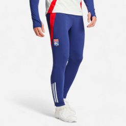 Spodnie piłkarskie treningowe ADIDAS Olympique Lyonnais 24/25. Spodnie sportowe damskie Adidas, l, z materiału, na fitness i siłownię. Za 199.99 zł.