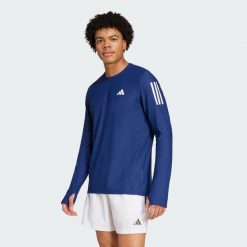 Koszulka Own the Run Long Sleeve. Niebieskie koszulki męskie z długim rękawem Adidas, xl, z materiału. Za 199.00 zł.