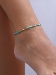 Luja Bijoux Pozłacana bransoletka z kryształami na kostkę rozmiar: onesize. Niebieskie bransoletki damskie Luja Bijoux, pozłacane. Za 43.78 zł.