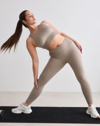 Damskie legginsy bezszwowe, prążkowane, wysoki stan, squat proof ciemna glina. Brązowe legginsy damskie Aim'n, m, bez wzorów, z dzianiny. Za 254.00 zł.
